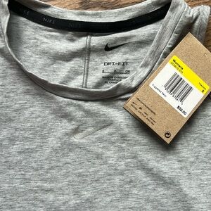 Extremely soft NIKE top never worn